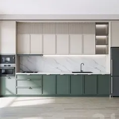 This kitchen design showcases a beautiful blend of materials. We used a soft green for the base cabinets, a fluted texture for the uppers, and a white marble backsplash. The integrated double oven and fridge complete the seamless, modern look.