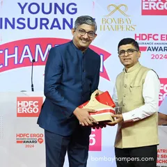 Another moment from the HDFC ERGO Insurance Awareness Awards, where I provided tailor-made sustainable hampers for the honorees. The consistent design reinforced the event's branding.