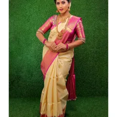 This full-length shot shows how the complete look comes together. The makeup, hair, and styling are all coordinated to create a cohesive and stunning image for this traditional photoshoot.