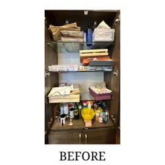 Before: A cabinet for art supplies, cluttered with paints, boxes, and tools, making it difficult for the artist to find what she needed.