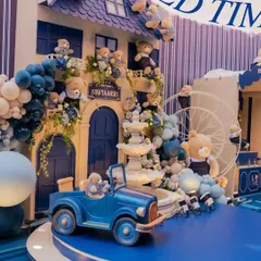A closer look at the teddy bear house, showcasing the intricate details like the teddy bear driving the car and the custom signage. This setup is perfect for creating magical photo opportunities.