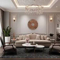 The living area centered around a plush beige sofa and a statement sunburst mirror, creating a warm and inviting atmosphere.