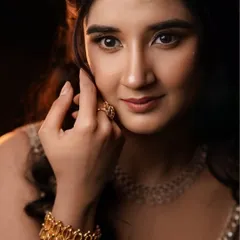 A close-up portrait, showing the subtle shimmer on the eyes and the flawless skin finish.