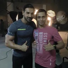On set with the incredibly fit John Abraham. His commitment to a healthy lifestyle is second to none.