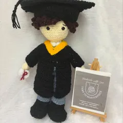 This is the male version of my graduation doll, complete with a graduation cap, gown, and a tiny diploma. It's a wonderful way to congratulate a new graduate.