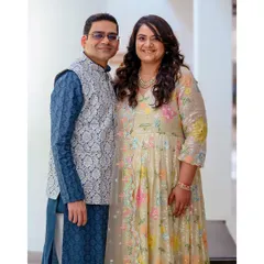 A formal portrait of the expecting couple, dressed in elegant traditional wear. I can tailor the style of the shoot to match your vision, from casual to formal.