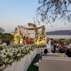 A wide view of the breathtaking wedding setup at The Oberoi UdaiVilas. We work at premier destination wedding venues to ensure your entertainment and choreography match the grandeur of the location.