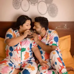 Sharing sweet cravings and sweet moments. An at-home shoot allows for natural, unposed interactions that truly reflect a couple's relationship and the happy waiting period.
