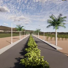 This perspective render shows the main access road, complete with a central green median, sidewalks, and street lighting. It helps visualize the future streetscape of the development.