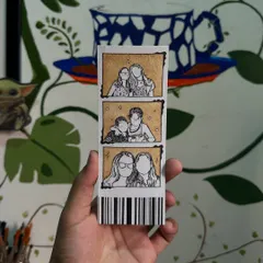 Here is a finished custom photo strip, showing three different memories illustrated in my signature style. The coffee-painted background really makes the black linework pop.