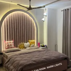 This is my dopamine recipe. A clean room with warm lights, cozy pillows, and my favorite things create a calming vibe that helps me unwind from the daily chaos.