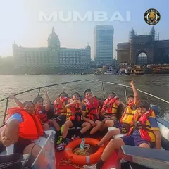 It's not all work and no play. Our team enjoys a boat ride in Mumbai with the Gateway of India in the background during our tour for The Winter Cup. These experiences are crucial for team bonding.