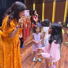 A personal interaction with a student during our NMACC workshop. We make sure every child feels involved and has a chance to participate directly.