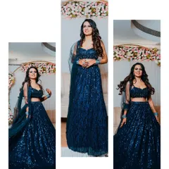 The bride looking stunning in a glittering blue lehenga for her Sangeet night. We capture the glamour and excitement of this musical evening.