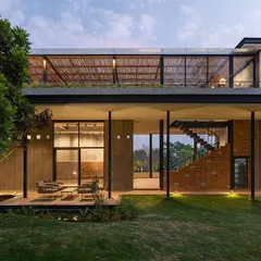 'The Earth' experience center at Nandi Hills showcases our belief in sustainable architecture. We integrate our structures with the natural landscape, using locally sourced materials and biophilic design principles to create a profound sense of place.