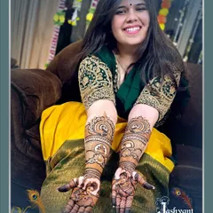 Another joyful photo of bride Ujala with her stunning, intricate bridal henna.