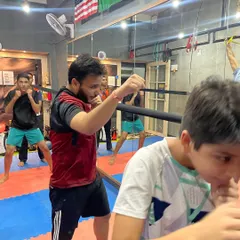 This is how we build awareness: 'ए भाई ज़रा देखके चलो'. In our group classes, we practice defensive movements and shadow boxing to stay sharp and alert from all angles.