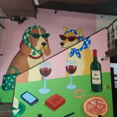 This quirky mural at a Gurgaon cafe brings a dose of fun and personality to the space. We specialize in creating custom characters and scenes that tell a story, making your establishment a memorable spot for customers.
