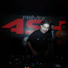 In my element, mixing tracks at Priveé. The setup here is world-class, allowing me to seamlessly blend different genres and keep the vibe fresh throughout the night.