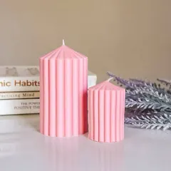 Simple and chic, these ribbed pillar candles come in two sizes. Their clean lines work well with minimalist and contemporary decor styles.