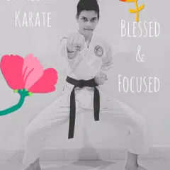 Blessed and Focused. This black belt student shows the powerful stance and sharp focus that comes from years of dedicated practice.