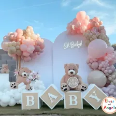 This elegant outdoor baby shower was designed with a soft, neutral palette. The 'Oh Baby' theme included adorable teddy bears, custom 'BABY' blocks, and beautiful balloon arrangements, creating a serene and picture-perfect setting for the parents-to-be.