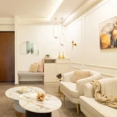This stunning living room is a masterclass in luxury. I combined beige and gold hues, a marble coffee table, and sleek, modern furniture to create a space crafted for comfort and style.