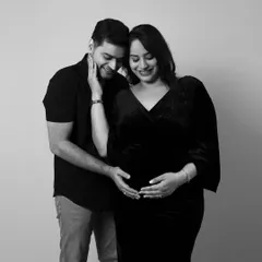 A timeless black and white photo capturing the intimacy between a couple. Studio sessions are perfect for these close-up, emotional portraits that focus on your connection.