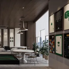 This angle of the games room shows a casual seating area and a gallery wall of retro gaming posters, adding a playful and personal touch to the design.