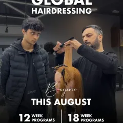 Your path to a global hairdressing career starts here. This image captures a moment of hands-on learning on a mannequin head, representing the practical training in our 12 and 18-week professional hairdressing programs.