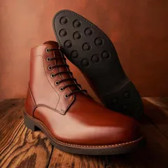 The best kicks are made of leather. This shot for Hanker Boots shows off the rich color and shine of the leather, as well as the sturdy sole. The warm, textured background adds to the heritage feel.
