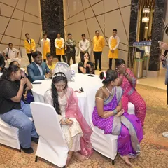 I don't just stay on stage. I love to move through the audience, interacting directly with guests and making them part of the entertainment during a corporate gala.