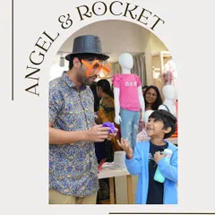 I love getting the kids involved, and sometimes that means being a little silly. Here’s me making a new friend and assistant during a show at the Angel & Rocket store.