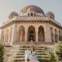 Set against the timeless architecture of Delhi's monuments, this shot captures a quiet moment of connection. I love using these historic locations for a classic and regal pre-wedding photoshoot.