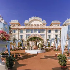 A destination wedding at a palace like The Leela in Jaipur is about making the venue itself a part of your story. Here, you can see the magnificent scale of a daytime ceremony I planned, with the stunning architecture providing a naturally royal backdrop. My job is to enhance this beauty with elegant decor that feels both grand and personal.