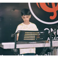 A student at his Casio keyboard during a practice session at the academy. I provide quality instruments for students to learn on.