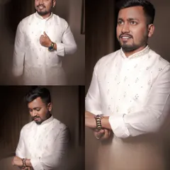 A set of classic portraits of the groom in his traditional white outfit. I focus on capturing a range of looks, from smiling to thoughtful.