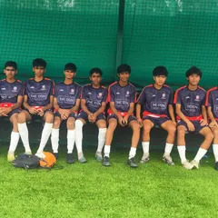 Our U17 players on the bench, ready to be called into action. Team unity is a core part of our philosophy.