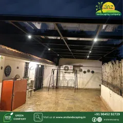 This large terrace was covered with a toughened glass pergola supported by a sturdy metal frame. We integrated spotlights into the structure to ensure the space is well-lit and usable long after the sun sets.