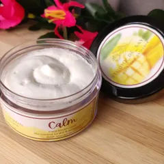 A closer look at the "Calm" face moisturizer. It's formulated with mango butter to calm sensitive skin and provide deep, lasting moisture without feeling heavy.