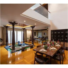 The heart of a home is often a central courtyard. Here, traditional Chettinad pillars ground the modern open-plan living space, creating a tranquil core that connects the entire family.