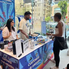 Our live art setup is a hub of activity. We engage with each guest to understand their vision, whether it's a simple initial or a complex design, making the customization process a core part of the event experience.