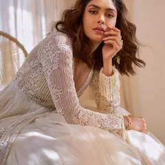 I had the incredible opportunity to be on the styling team for Mrunal Thakur's HT City Showstoppers cover shoot. We created this ethereal look with an ivory skirt and an intricately embellished jacket, balancing Bollywood glamour with her signature understated charm.