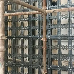 A close-up of the modular panel system during installation. The quality of materials is key to a long-lasting vertical garden.