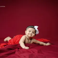 This little one is on the move. Capturing babies as they start to crawl is a fun way to document their growing independence and playful spirit.
