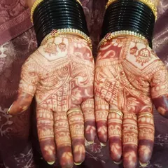 Here you can see the beautiful, rich reddish-brown stain that my homemade organic henna leaves after the paste is removed. This deep color is the result of using 100% natural ingredients, ensuring it's safe for your skin and looks stunning for your special day.