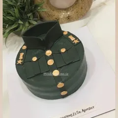 Another angle of the meticulously designed army uniform cake.