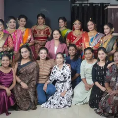 A group photo with my talented students and their beautifully styled models after a successful portfolio day at the academy.