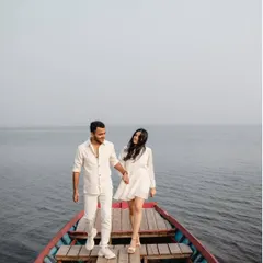 There's nothing more serene than being on the water. We took a boat out on Pawna Lake for this shoot, capturing the couple as they walked on the boat, surrounded by calm.