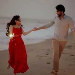 Running along the shore with sparklers in hand, Keerthi and Arun's pre-wedding shoot was filled with light and laughter. A beach setting offers a beautiful canvas for capturing carefree, romantic moments.